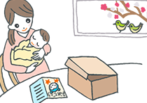 出産祝いのメッセージカードを読む女性