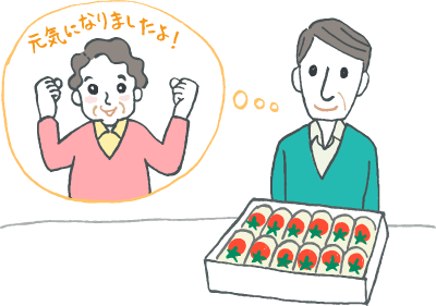 快気祝いの品を見ながら友人を思い浮かべる男性 快気祝いの品を見ながら友人を思い浮かべる男性