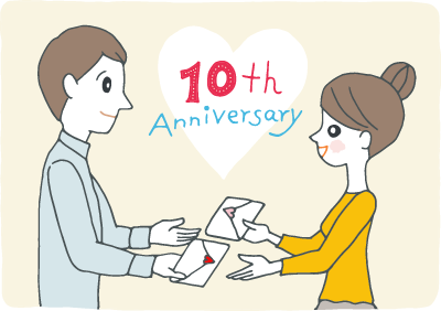 手紙を贈り合う結婚10周年の夫婦 手紙を贈り合う結婚10周年の夫婦